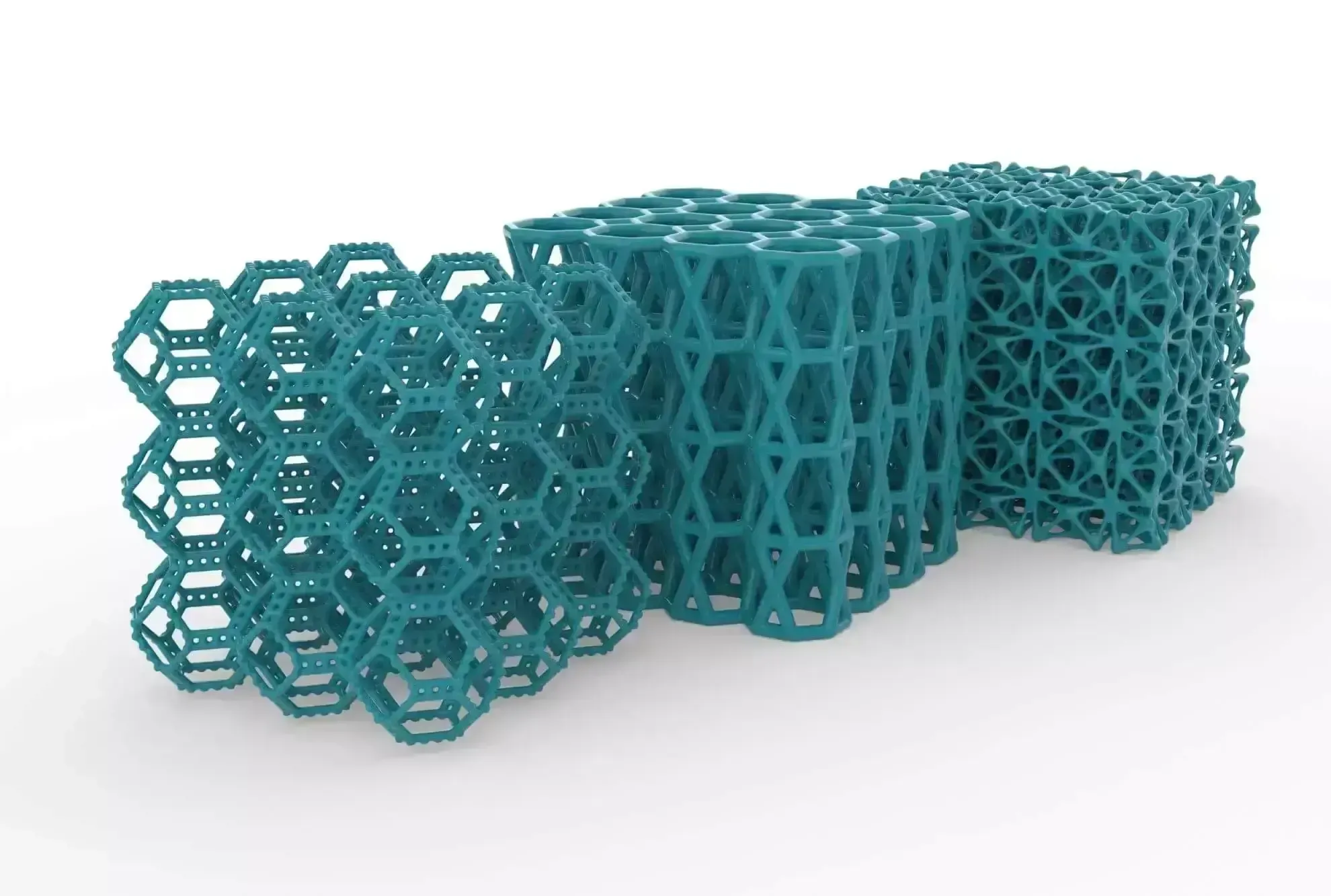Teal lattice structure samples in hexagonal and cubic forms on a white background