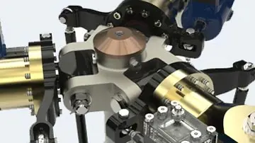 Solid Edge rendering of a mechanical assembly with brass fittings and black linkage arms